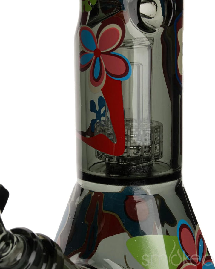 Close-up of Cheech & Chong dual chamber percolator and hex beaker base with floral decal
