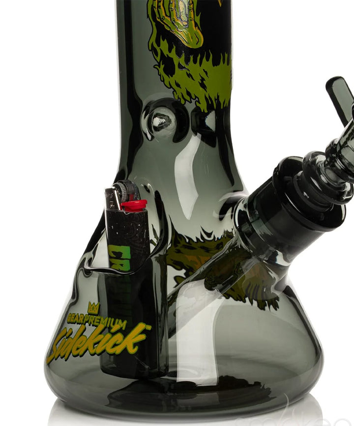Close-up of GEAR Premium x Creature Hell Sidekick bong showing lighter holster and green dragon graphic detail