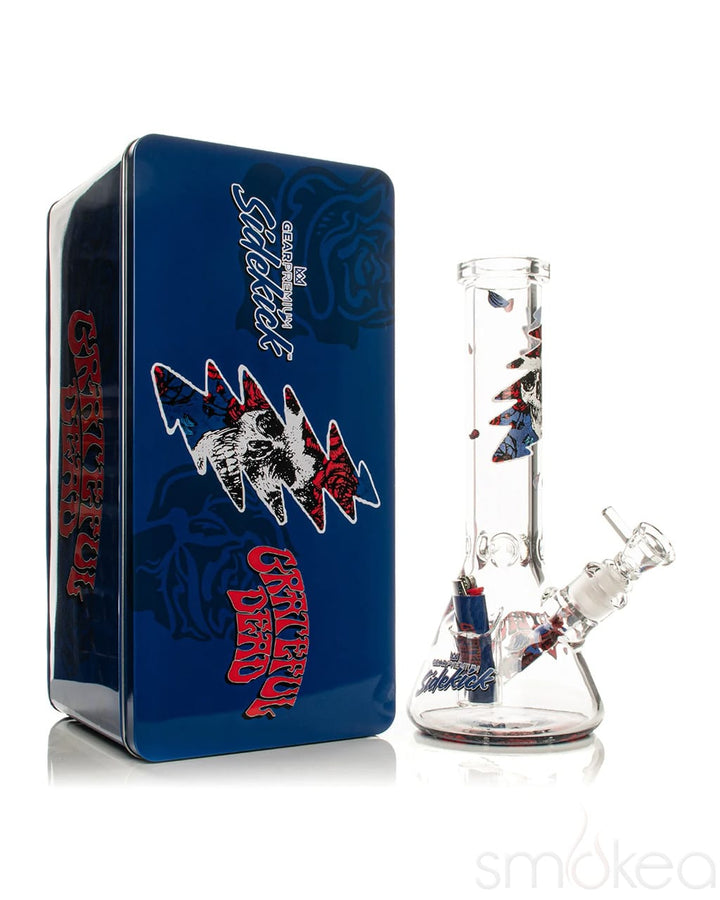GEAR x Grateful Dead 12 inch Bertha Sidekick Bong next to collectible Grateful Dead artwork tin