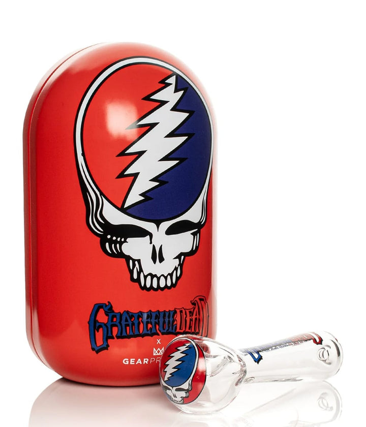 Red Grateful Dead Steal Your Face collectible tin with glass spoon pipe