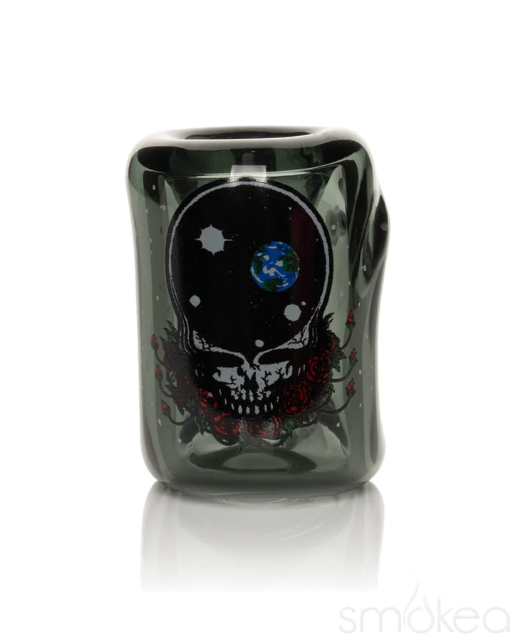 Close-up of black Grateful Dead collectible tin with Space Your Face skull, globe, and roses design