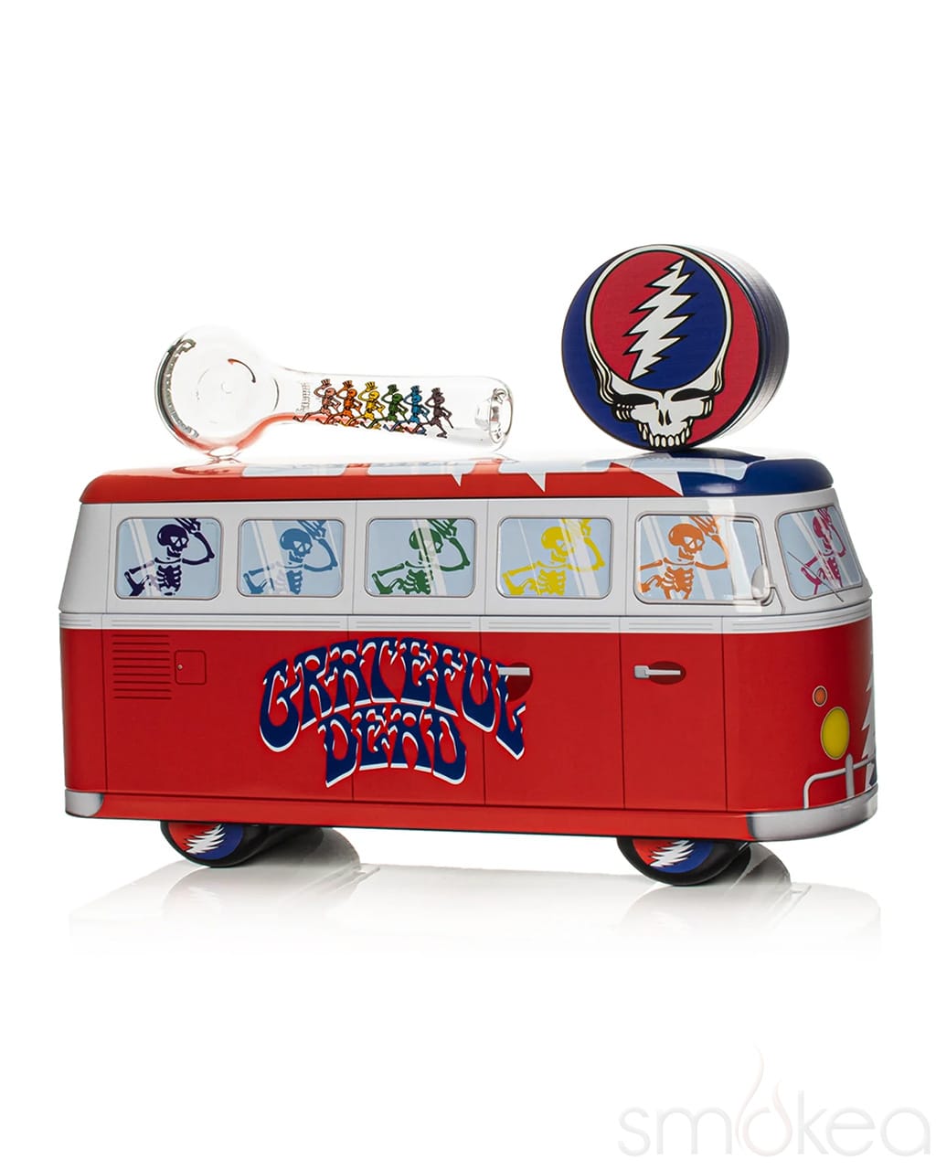 Red Grateful Dead Dancing Skeleton bus tin with glass spoon pipe and Steal Your Face medallion on top