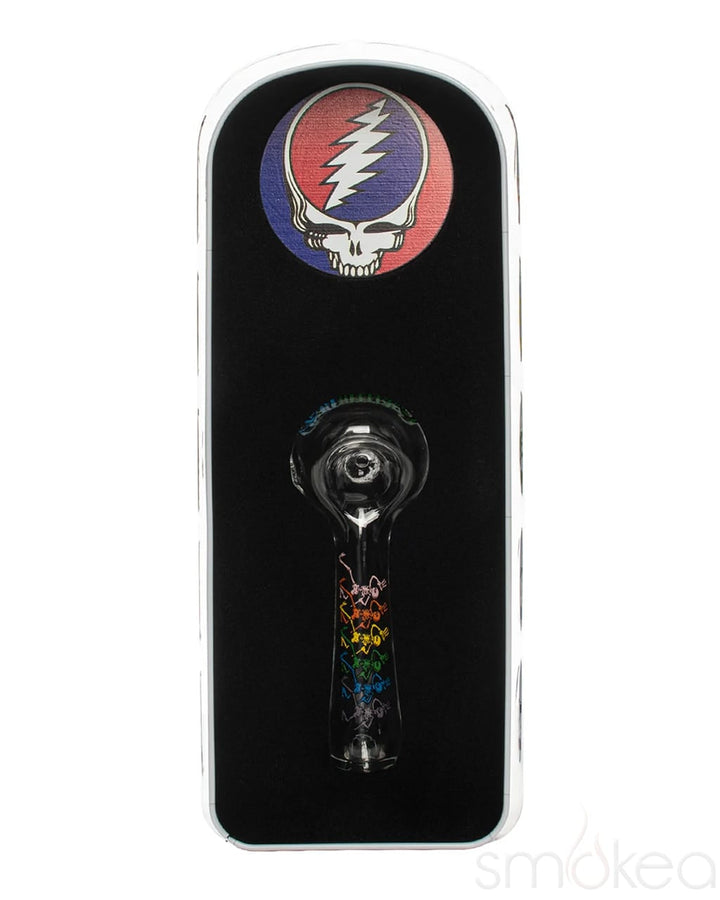 Clear glass spoon pipe with Dancing Skeletons design and Steal Your Face medallion background