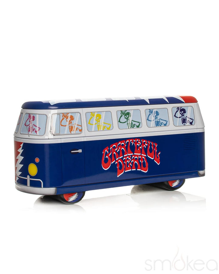 Blue Grateful Dead collectible tin shaped like a VW bus with dancing skeletons and lightning bolt design