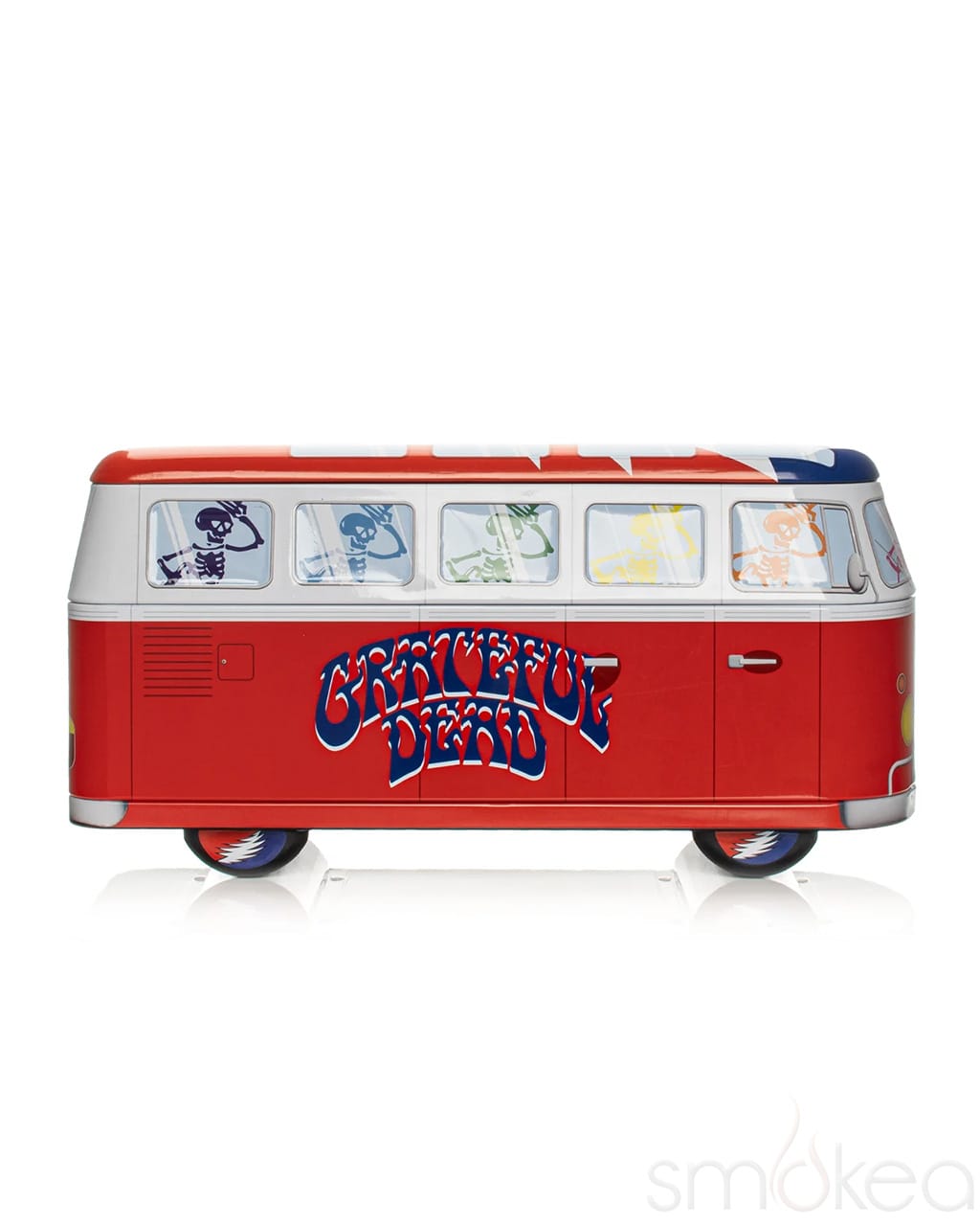 Red and white Grateful Dead collectible bus tin with dancing skeletons and Steal Your Face wheel decals