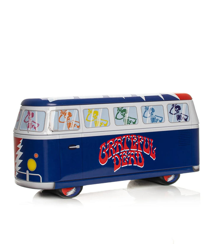 Blue Grateful Dead collectible tin shaped like a VW bus with dancing skeletons and lightning bolt design